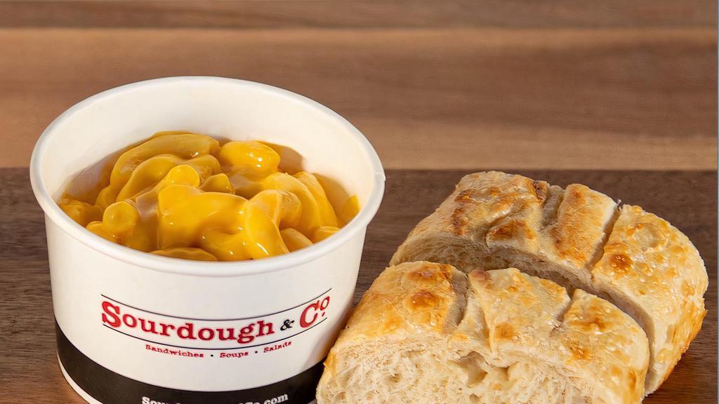 Mac & Cheese · The ultimate comfort food elbow macaroni in a creamy, decadent cheese sauce. Small served with 2 slices of our sourdough bread, large served with 3 slices.