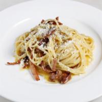 Spaghetti Carbonara · Eggs, pork cheek, and pecorino romano.