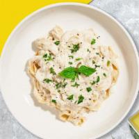 Frodo's Alfredo Pasta · Fresh fettuccine pasta served with a creamy alfredo sauce and your choice of toppings.