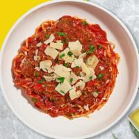 Bolognese And Peace Pasta · Fresh spaghetti served served with ground beef red sauce and your choice of toppings.