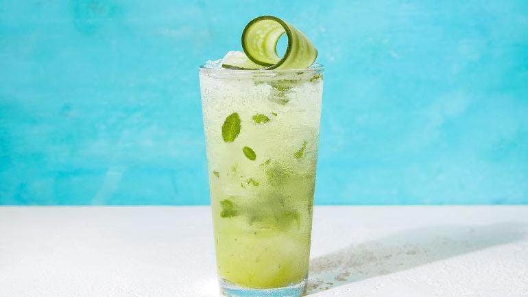 Cucumber Reviver · Freshly puréed pineapple & cucumber with Monin Cucumber, torn mint and agave sour, topped with sparkling water.