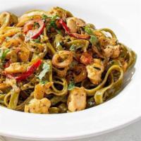 Chicken Tequila Fettuccine · Our creamy jalapeño lime sauce with spinach fettuccine, red onions, bell peppers and fresh c...