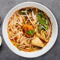 Tofu Pho · Marinated and grilled tofu with aromatic vegetable broth, carrots, broccoli, zucchini, and c...