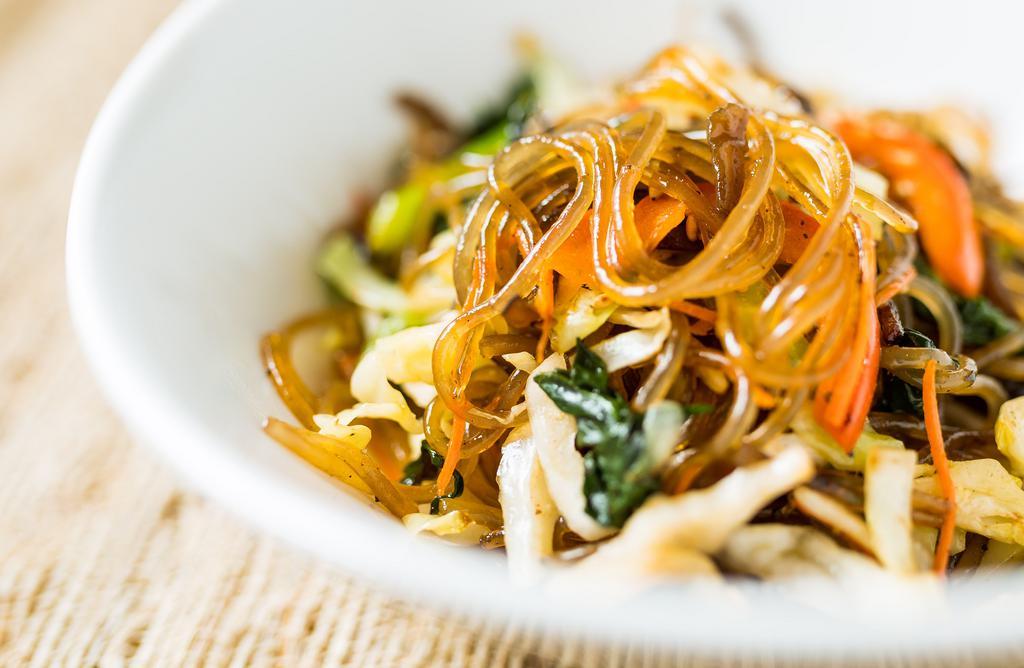 Veggie Jhap Chae · Stir-fried glass noodles, mushrooms, julienned carrots, onion, spinach, cabbage, green onions, bell peppers, and sesame oil