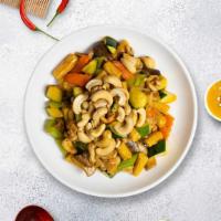 Cashew O'Cluck · Chicken stir-fried with celery, broccoli, snow peas, white mushrooms, carrots, water chestnu...