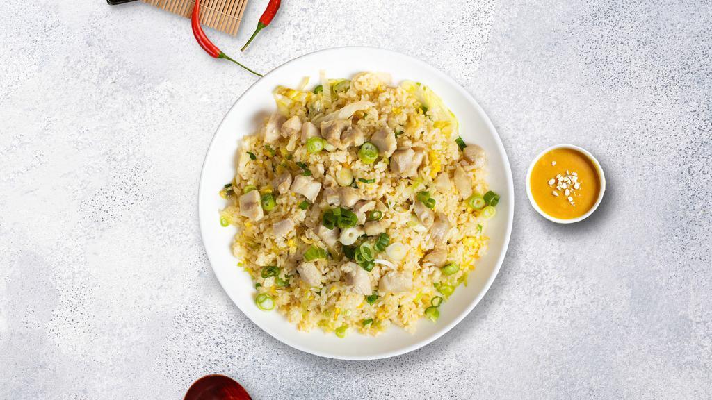 Fried Rice O'Cluck · Chicken pan-fried with steamed rice, egg, peas, and green onions