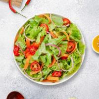 Eden's Garden Salad · (Vegetarian) Romaine lettuce, cherry tomatoes, carrots, and onions dressed tossed with lemon...