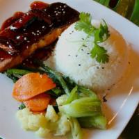Salmon Teriyaki · Teriyaki glazed salmon, crispy salmon skin, asian style vegetables, and a shitake mushroom j...