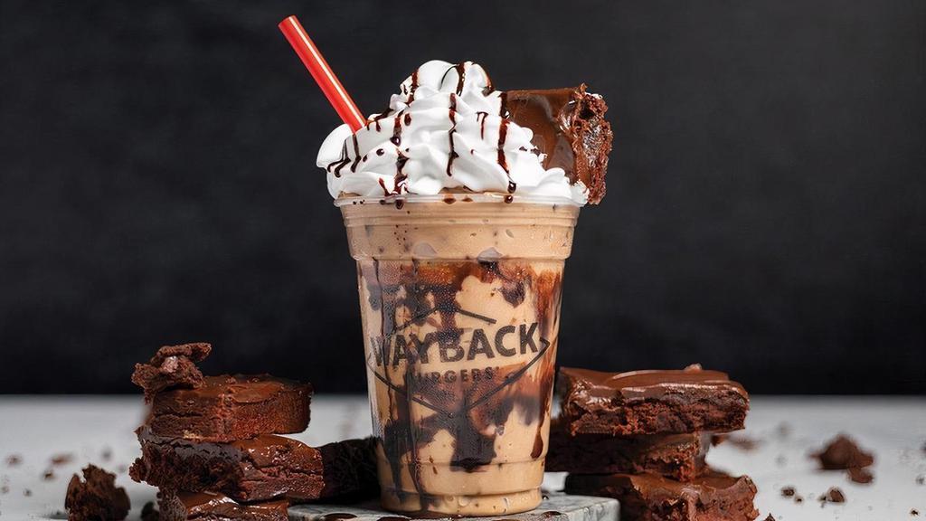 Brownie Milkshake (LTO) · Hand-dipped vanilla milkshake perfectly blended with real brownies, a signature chocolate syrup, and topped with whipped cream and chocolate drizzle