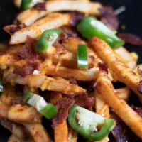 Fiery Fries · Wayback fries coated with Texas Pete seasoning, topped with Texas Pete seasoned bacon, chees...