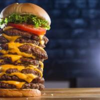 The Nine Patty Burger · Nine (That's Right, Nine!) Fresh, 100% all beef Patties, Nine slices of American Cheese, Let...