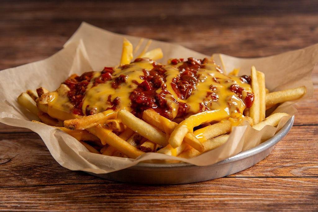 Chili Cheese Fries · Our traditional French Fries topped with Chili and Cheddar Jack cheese. Think that’s too much for a side? We say there’s no such thing!