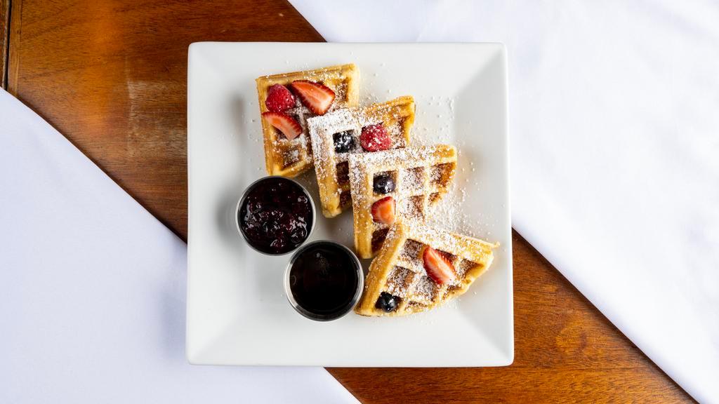 Belgian Waffles · Serve with berries coulis and vanilla icing.