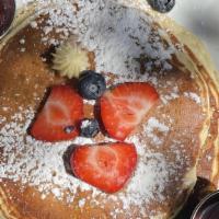 Buttermilk Pancakes 2 Stack · Serve with honey or maple syrup and seasonal compote.