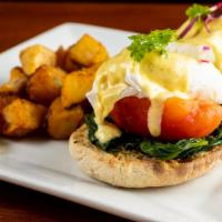 The Florentine Benedict · Delight fully prepared english muffins, garlic roasted tomatoes, sautéed baby spinach, two p...