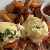 Wildcat Benedict · Delight fully prepared english muffins, garlic roasted tomatoes, bacon, two poached eggs and...