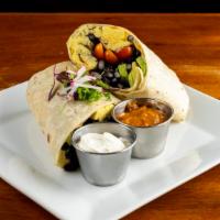 Breakfast Burrito · Two scrambled eggs, your choice of pork sausage or chorizo, salsa, b/f potatoes and black be...