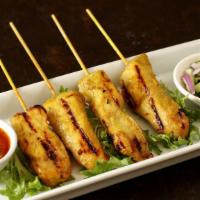 Satay · Grilled marinated chicken or beef skewers.
