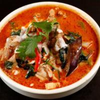Red Curry · Bell pepper, eggplant, zucchini, bamboo shoots, and variety of vegetables simmered in red co...