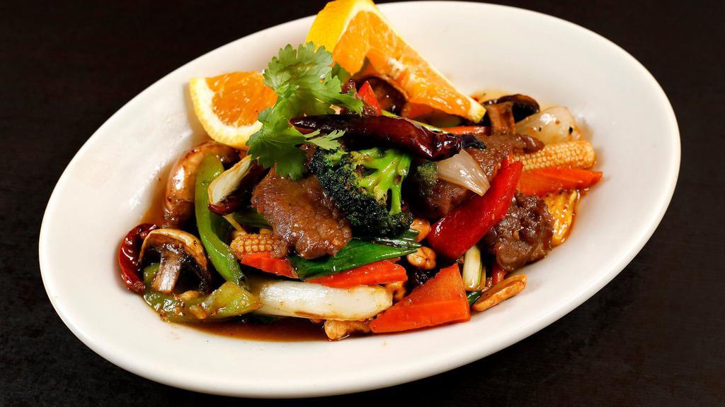 Pad Hi Ma Parn (Cashew Nuts) · Roasted cashew nuts with onions, green onions, carrots, mushroom, zucchini, and dried chili in sauce.