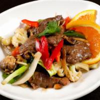 Pad Khing (Ginger) · Fresh ginger, mushroom, onions, baby corn, and variety of vegetables.