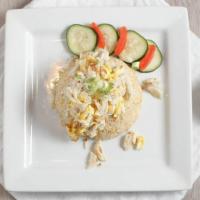 Crab Fried Rice · Fried rice with crab meat, egg, onions, green onions, and tomatoes.