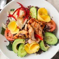 Healthy Bowl · Grilled marinated salmon with mixed grains and beans, shredded mango, avocado, pickled ginge...