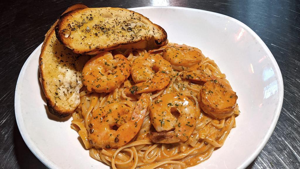 Spicy Shrimp Linguini · in ancho chile sauce with mushrooms