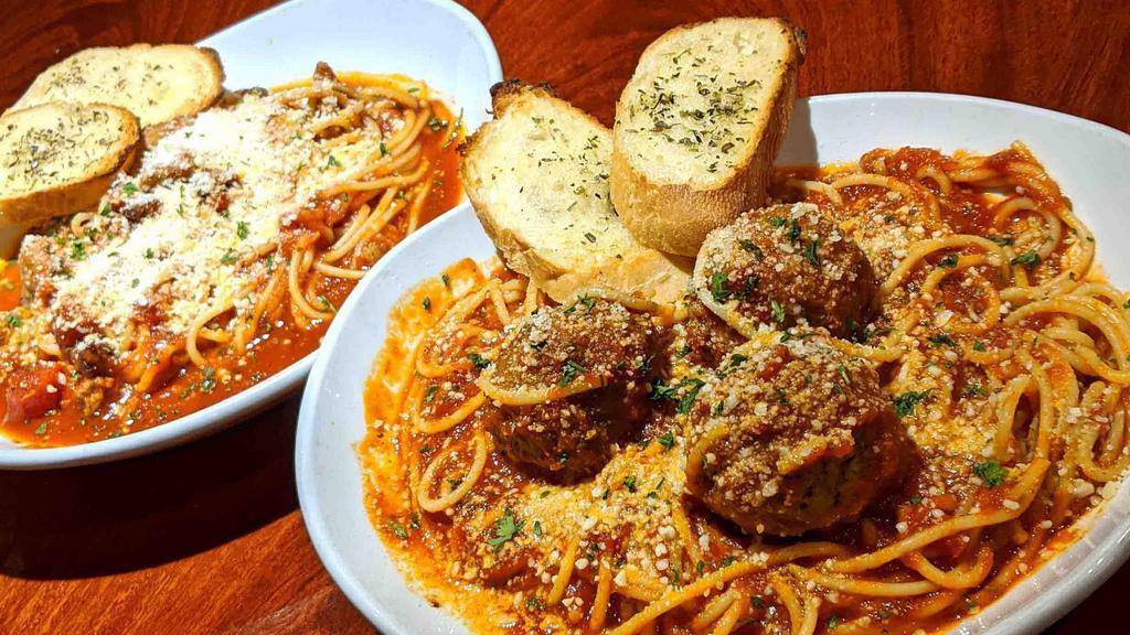 Spaghetti Marinara · with marinara. add 1-4 meatballs  +2.00 ea. [pictured with and without meatball add-on]