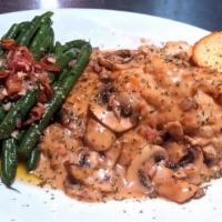 Chicken Marsala · in a creamy garlic marsala wine sauce; sauteed with mushrooms & onions
[pictured with green ...