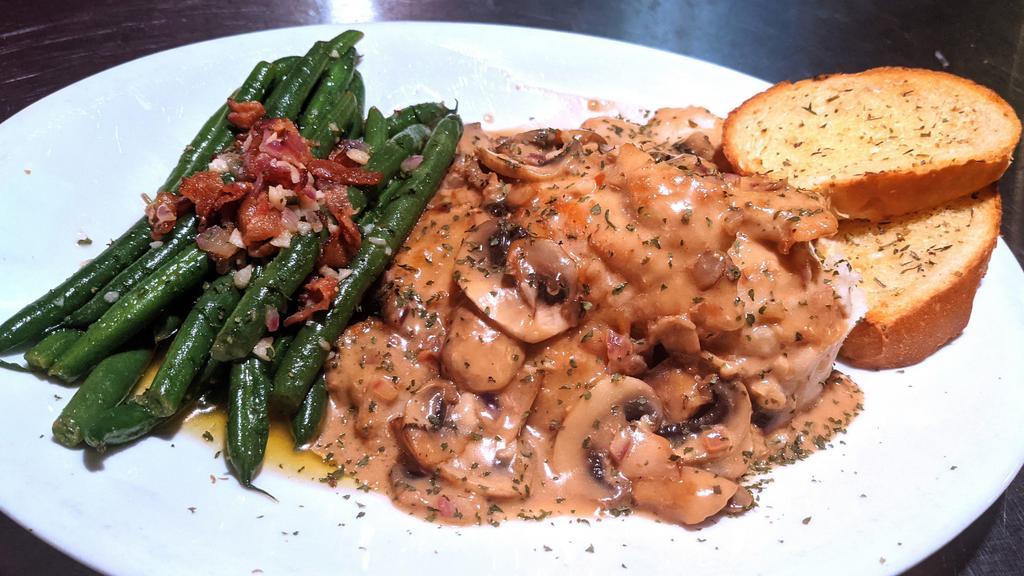 Chicken Marsala · in a creamy garlic marsala wine sauce; sauteed with mushrooms & onions
[pictured with green beans & bacon add-on]