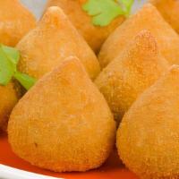 Coxinha · 200 gram of our most traditional Brazilian pastry, filled with creamy chicken and cream chee...