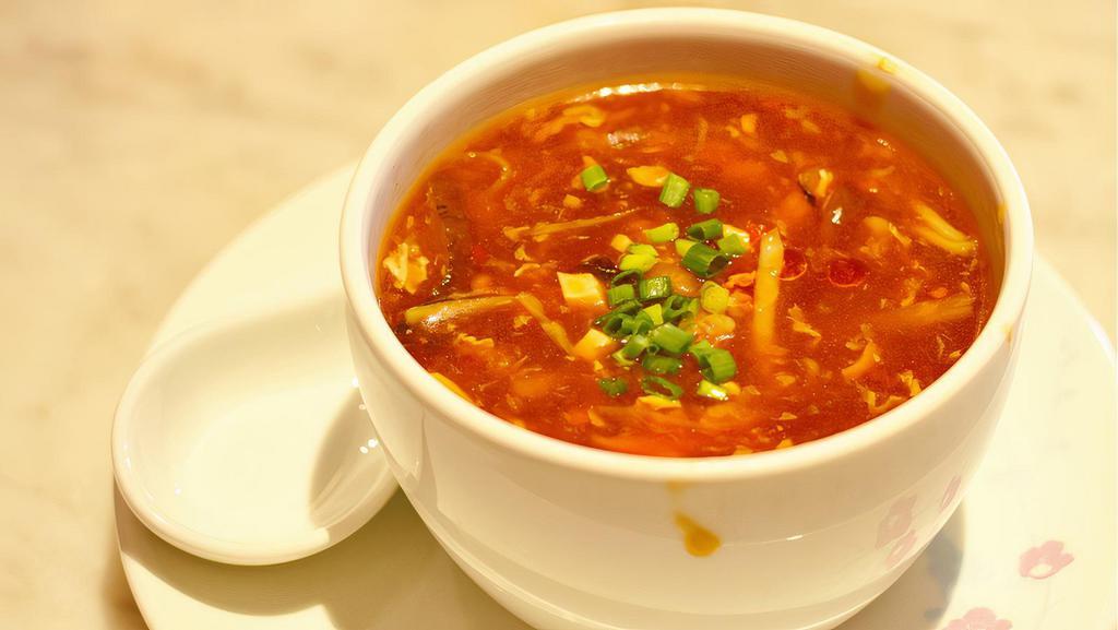 Hot And Sour Soup · Shiitake mushroom, tofu, bamboo shoot, eggs, green onion. Choice of chicken, seafood, or vegetables.