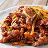 Mongolian Beef  · Sliced beef with onions and mixed veggies