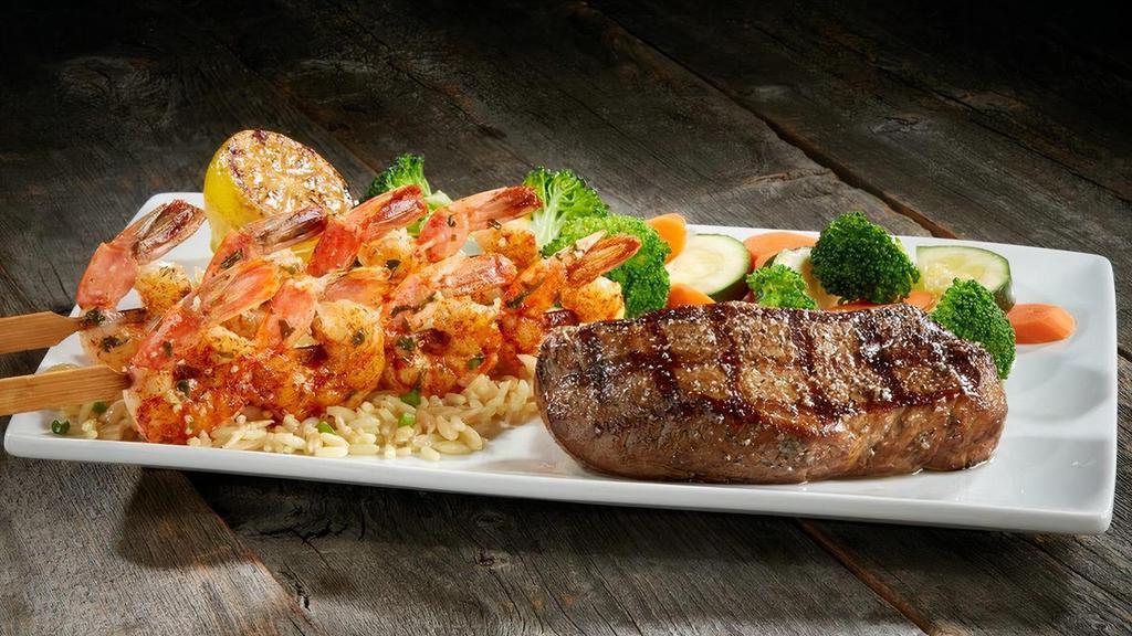Steak & Grilled Shrimp Skewers  · NEW! All natural wild-caught jumbo shrimp served with hand-cut 6oz tri-tip sirloin and choice of side