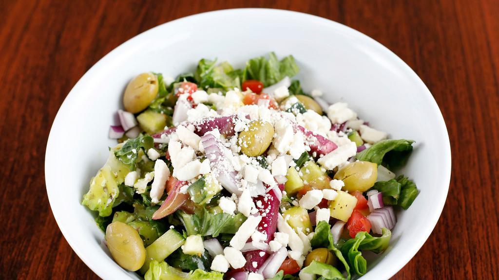Greek Salad · Lettuce, tomatoes, cucumber, onion, feta cheese and Italian dressing.