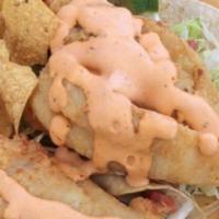Fish Taco · Cabbage, salsa & chipotle sauce.