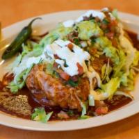 Palo Alto's Burrito Pick · A delicious burrito with a chili relleno and grilled beef, beans, rice salsa. Topped with a ...