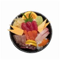 Chirashi · Assortment of sashimi over sushi rice. Served with miso soup and salad.
