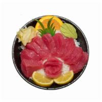 Tekka Donburi · Tuna sashimi over sushi rice. Served with miso soup and salad.