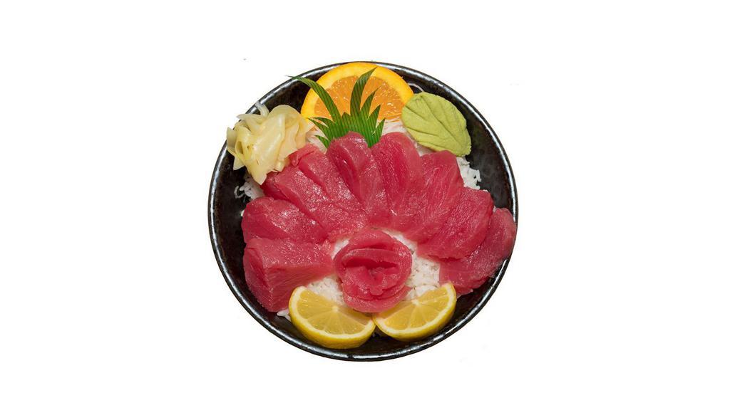 Tekka Donburi · Tuna sashimi over sushi rice. Served with miso soup and salad.