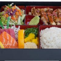 Sashimi with Chicken Teriyaki · Four pieces of tuna sashimi, three pieces of salmon sashimi with chicken teriyaki. Served wi...