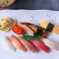 Yo Nigiri Combo · Nine pieces of nigiri (tuna, white tuna, salmon, hamachi, ika, unagi, tamago, tobiko, ebi) s...