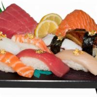 Nigiri & Sashimi Combo · Seven pieces of nigiri  (tuna, salmon, hamachi, ika, tako, unagi, ebi) four pieces of salmon...