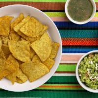 Family Guacamole (8 oz.) Chips, and Salsa · Guacamole, chips and salsa to share