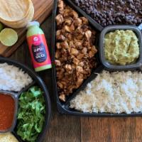The Fiesta Taco Box · Fiesta size serving of 4 different protein choices, 2 lbs of cilantro rice (vegan), 2 lbs of...