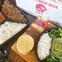 The Family Taco Box · 2 Family-sized servings of your choice of Protein, 16 oz of cilantro rice (vegan), 16 oz of ...