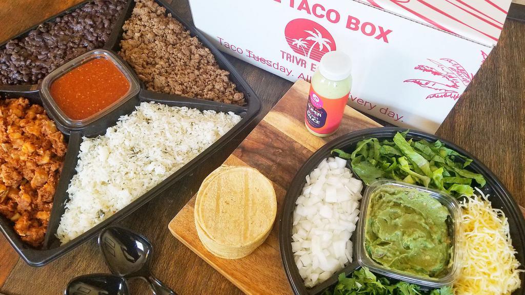 The Family Taco Box · 2 Family-sized servings of your choice of Protein, 16 oz of cilantro rice (vegan), 16 oz of seasoned black beans (vegan), choice of salsa, chopped cilantro, diced onions, cheese, and 16 tortillas. Serves 3-4 people.