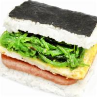 Seaweed Salad Onigiri · Seaweed Salad, egg and spam, mayo.
