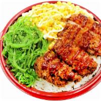 Pork Katsudon · Rice bowl with pork katsu, corn,  seaweed salad, katsu sauce, mayo.